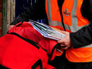 Supporting image for story: Posties walk out as strike goes on