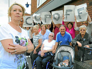 Supporting image for story: Fury over policing cuts
