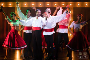 Anton, with moustache, gatecrashes the Bella Ciao routine