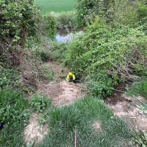 Rosie is winched to safety by a firefighter. Picture: Shropshire Fire and Rescue Service