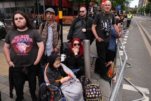 Fans gathering at the Black Sabbath Bridge bench on Broad Street in Birmingham in memory of Black Sabbath frontman Ozzy Osbourne