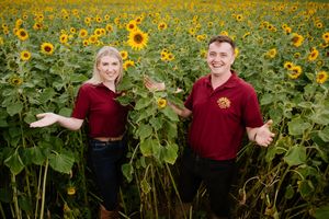 Little Wytheford Farm near Shawbury has for the second year opened their gates to their Sunflower Farm after the huge success from last year. They had planted over three million sunflower seeds. In Picture: Amelia Davies and Simon Davies
