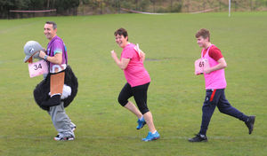 Principal Rod Hughes, vice-principal Bridget Ball, and 16-year-old Connor Bishop