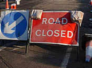 Supporting image for story: Road blocked as pipe bursts