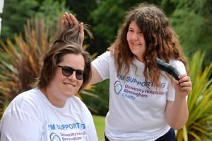 The pair preparing for the shave