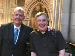 New church warden Bob Yardley with Canon Ben Whitmore