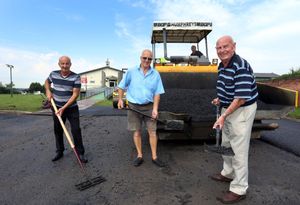Club chairman Vinny Lines, Phil Hodges and president Ray Grocott oversee the resurfacing of the car park