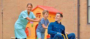Simon Brodkin with nurse Jodie McCuskey and patient Zac James 7 from Shrewsbury