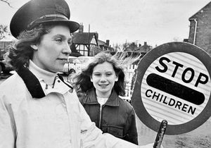November 1974: 'Mrs Marjorie Tunks, of Station Road, Hodnet, with Clare Rogers, one of the pupils at Hodnet County School who have nominated her as an entrant in the national competition to find the lollipop man or woman of the year.'