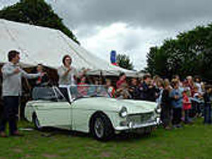 Supporting image for story: Sporting vicar revs up for flock