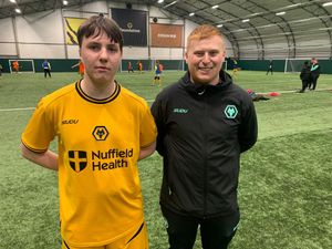 Wolves Disability Under-16 player Josh, and coach Mark Bromley.