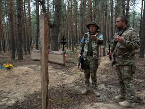 Supporting image for story: Mass burial site includes torture victims, says Ukraine’s president