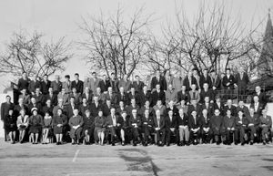 Staff, drivers, and directors in a group picture taken for the Salopia Saloon Coaches golden jubilee.