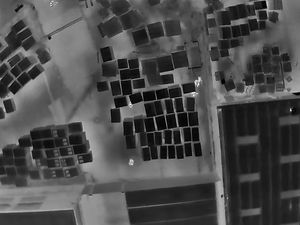 Supporting image for story: Police drone footage shows suspect hiding in pallet yard following pursuit in Stafford