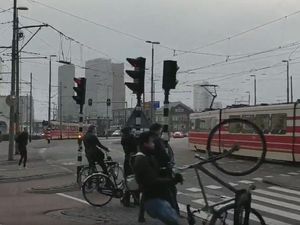 Supporting image for story: Watch as strong winds in Europe tear this cyclist’s bike out of their grasp