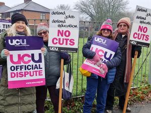 The placards spoke about no cuts and defending education and jobs