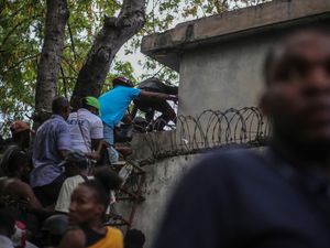 Supporting image for story: Two reporters and a police officer killed in gang attack in Haiti