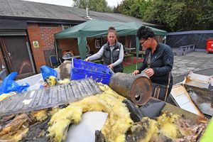 The clean-up operation at Fens Pool Community Centre. Photo: Tim Sturgess