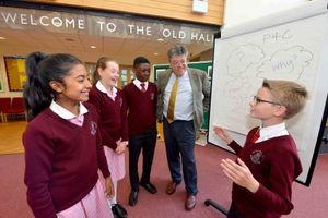 Harry shares his thoughts with his classmates