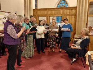 Supporting image for story: Choir celebrates belated 20th anniversary with special thanks to member