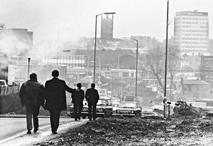 November 1971: 'A new vista of the developing Wolverhampton - a scene revealed by demolition of old buildings at the town end of Penn Road, to make way for road improvements. Looking across Penn Road traffic island, the outlines on the horizon are Wolverhampton Polytechnic, St Peter's Church and Mander House.'