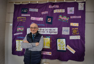Brother Stephen Brennan poses with one of the many displays inside the building