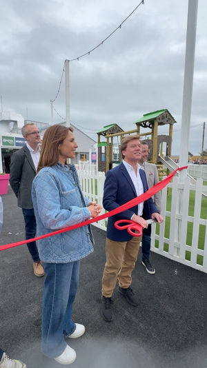 Unity Beach's chief operating officer Dermot King prepares to hand the giant scissors to Alex Jones as she officially unveils the new facilities at the Somerset holiday park.