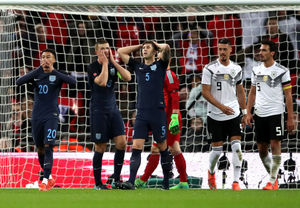 Jesse Lingard (left), Eric Dier and John Stones (centre) react after a missed chance.
