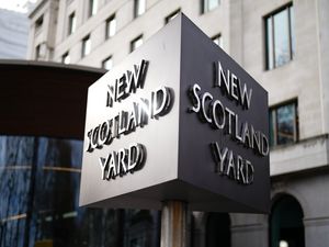 A sign for Scotland Yard