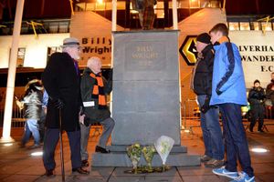 Fans Pes Pickerill, Billy Owen, Dave Hurdiss and Jack Hurdiss pay their respects on Tuesday night