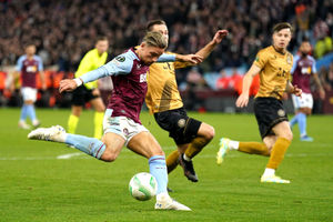 
            
Aston Villa's Matty Cash attempts a shot on goal