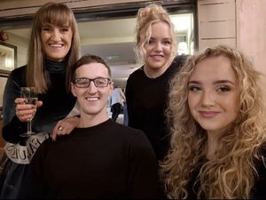 Scott Hinch with his mum Fiona and sisters celebrating the end of treatment