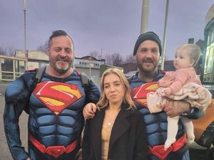 Supporting image for story: Crowd celebrate homecoming of Supermen who scootered from Newcastle to Lower Gornal