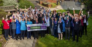 The staff celebrate a great achievement  