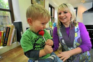 Finley Birchall, aged 2, makes sure cakes baked  by mumpreneur Silvia Birchall pass the all-important taste test