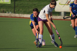 Stourport pays close attention to a Loughborough forward.