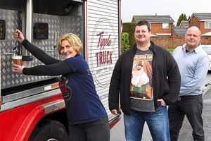 Mel pours a pint from the transformed former fire engine