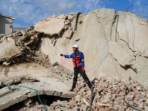 Supporting image for story: Dozens still missing after South Africa building collapse