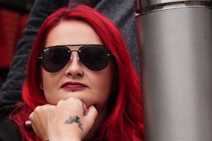 Fans gathering at the Black Sabbath Bridge bench on Broad Street in Birmingham