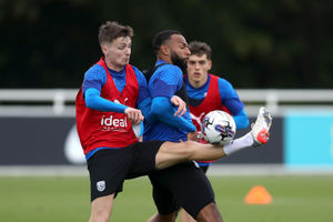 Zac Ashworth and Matt Phillips battle for the ball (Photo by Adam Fradgley/West Bromwich Albion FC via Getty Images).