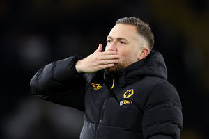 Assistant boss Harry Watling salutes the Wolves fans at full time (Photo by Brett Patzke - WWFC/Wolves via Getty Images)