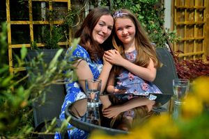 Ange Barre and Jessica Barre, aged 9, who is a young carer for her mom
