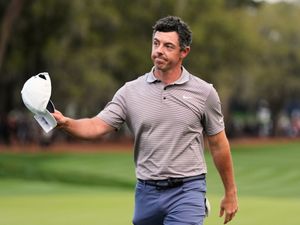 Rory McIlroy reacts after completing the 18th hole during the final round