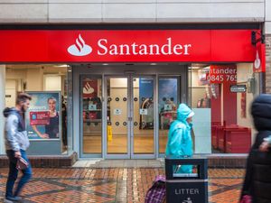 Supporting image for story: Santander axes 2,000 jobs and warns more cuts are possible