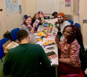 Birmingham campaigners use a festive message to ask local MPs to fight for asylum seekers' right to work. Front left, Asylum Matters Campaign Manager Emma Birks