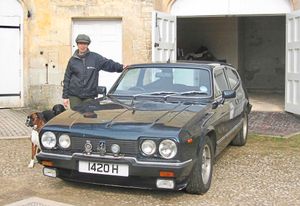 HRH with her first Scimitar, a 1970 Reliant model