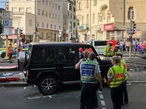 A large black vehicle at the scene