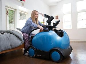 Supporting image for story: This wheelchair requires users to ride it like a horse