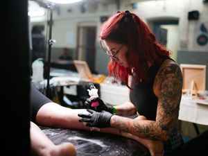 Supporting image for story: Shrewsbury Prison plays host to tattoo convention with 70 artists, live bands and a graffiti show