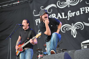 Matthew Davies-Kreye and Gavin Burrough of Welsh post-hardcore band Funeral For A Friend, live on stage at Reading Festival in 2009